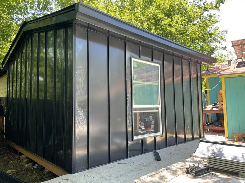 Black standing seam metal wall panels for Metal Roof Installation in Riviera Beach